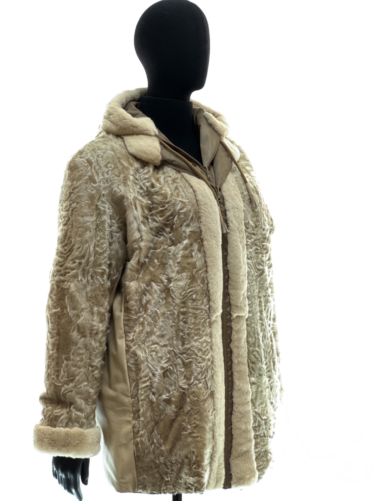 Sand-colored lamb coat with sheared mink trim, reversible design, detachable hood, and waterproof stone-colored fabric