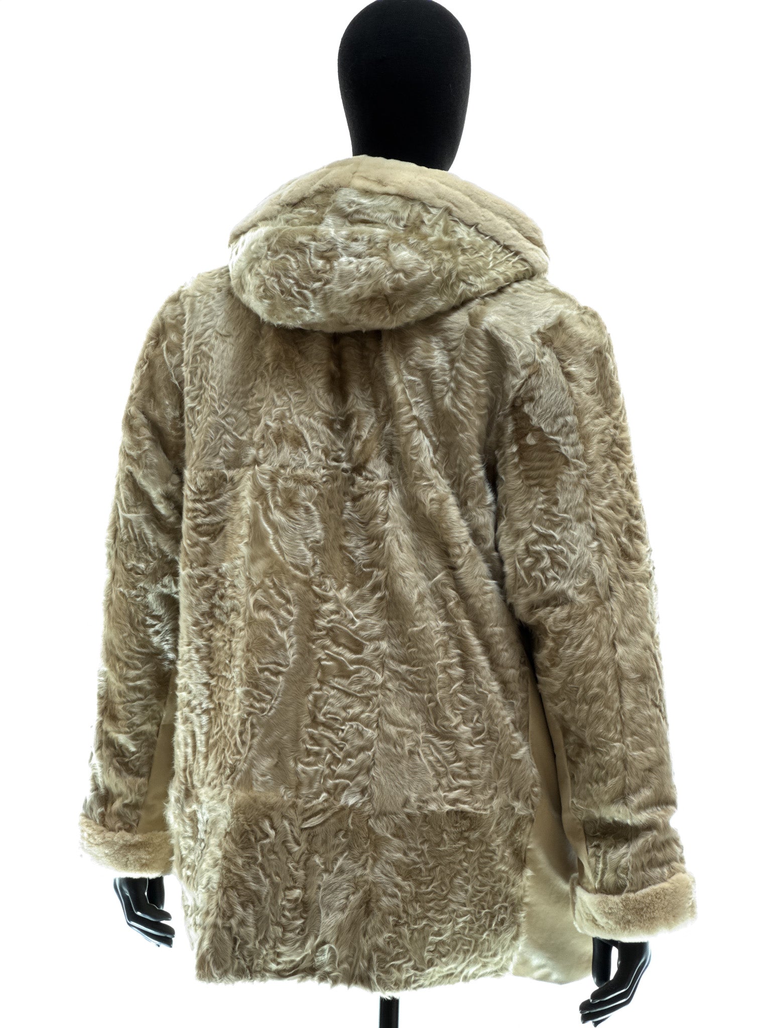 Sand-colored lamb coat with sheared mink trim, reversible design, detachable hood, and waterproof stone-colored fabric