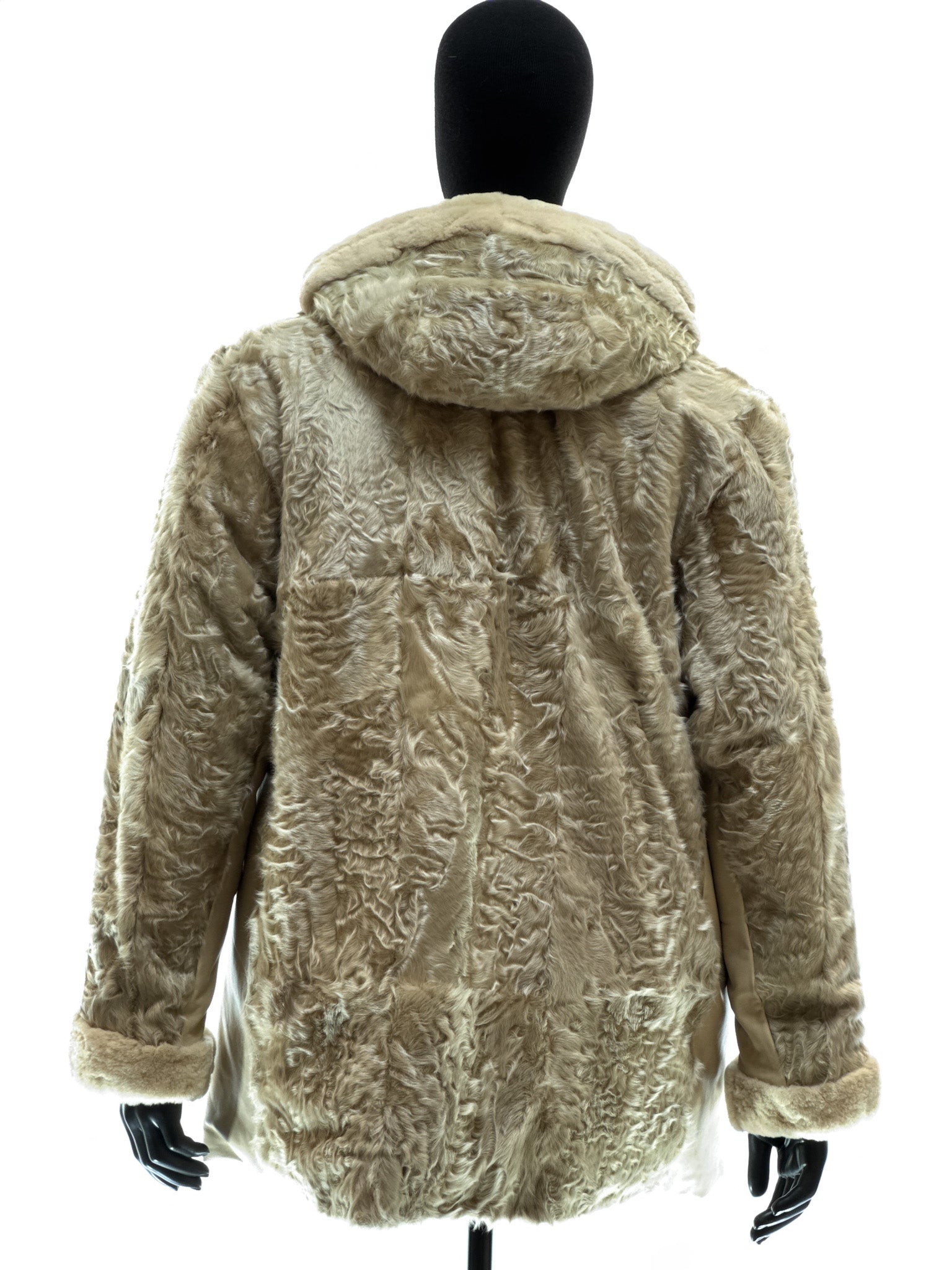 Sand-colored lamb coat with sheared mink trim, reversible design, detachable hood, and waterproof stone-colored fabric