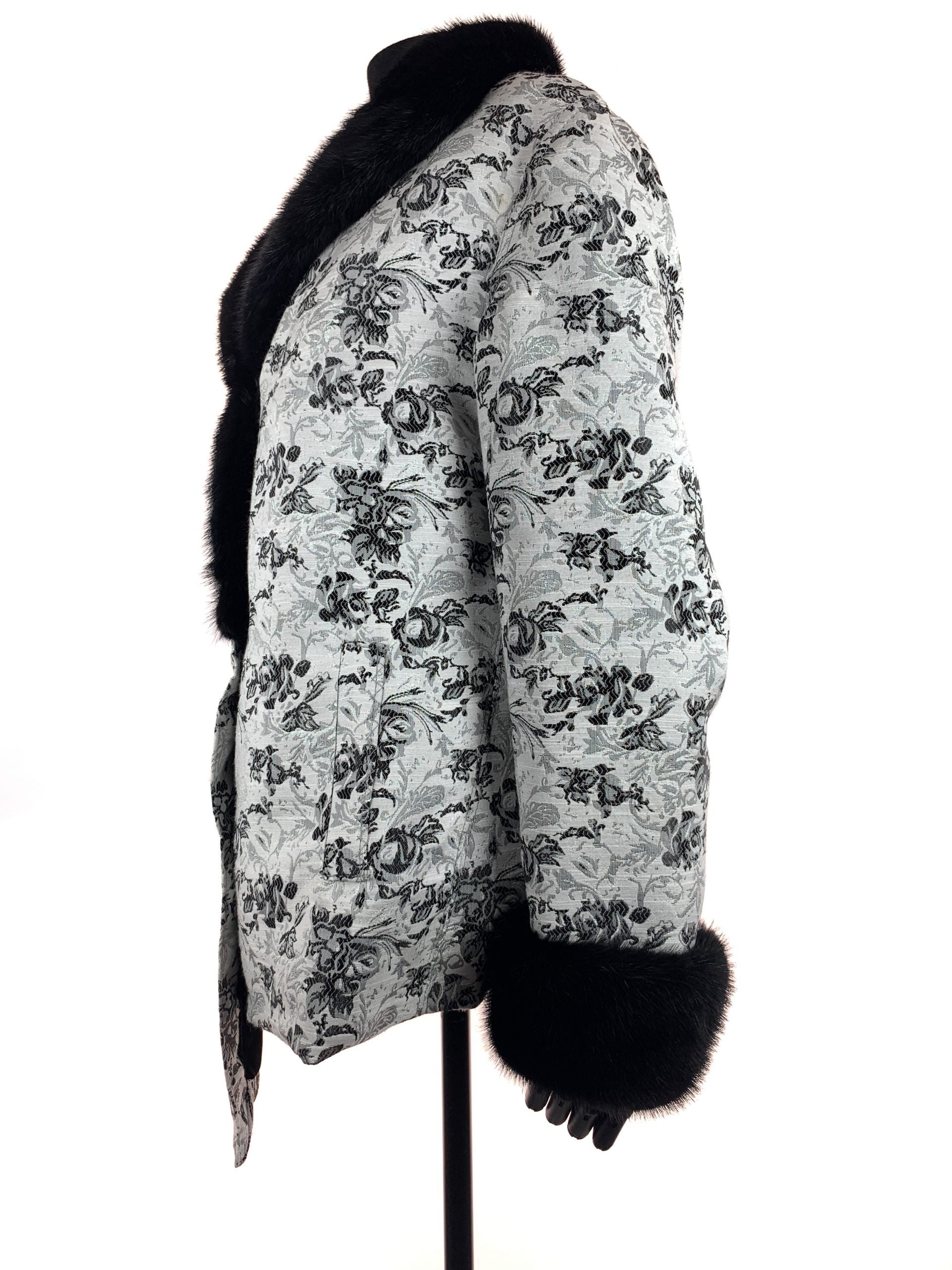 Black iris on Nordic white cloth with black mink collar and cuffs - Iris