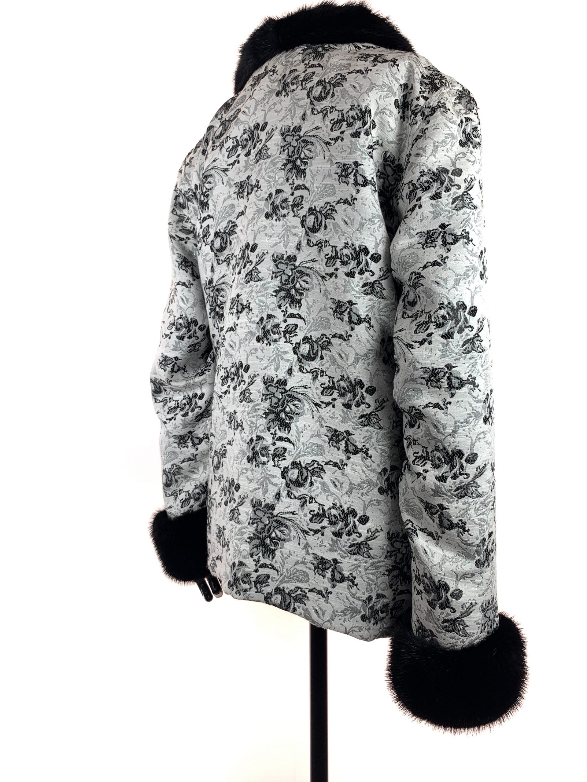 Black iris on Nordic white cloth with black mink collar and cuffs - Iris