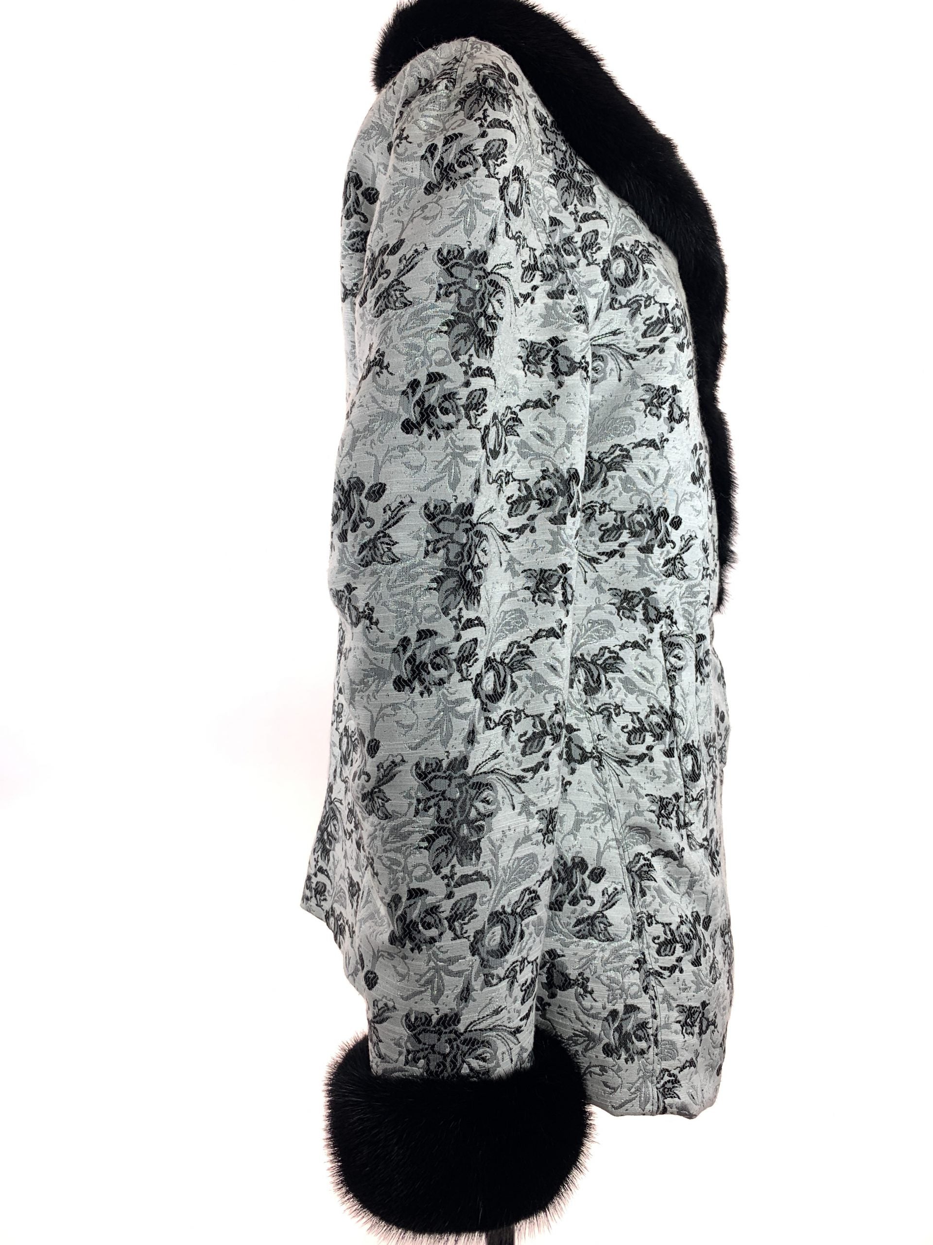 Black iris on Nordic white cloth with black mink collar and cuffs - Iris