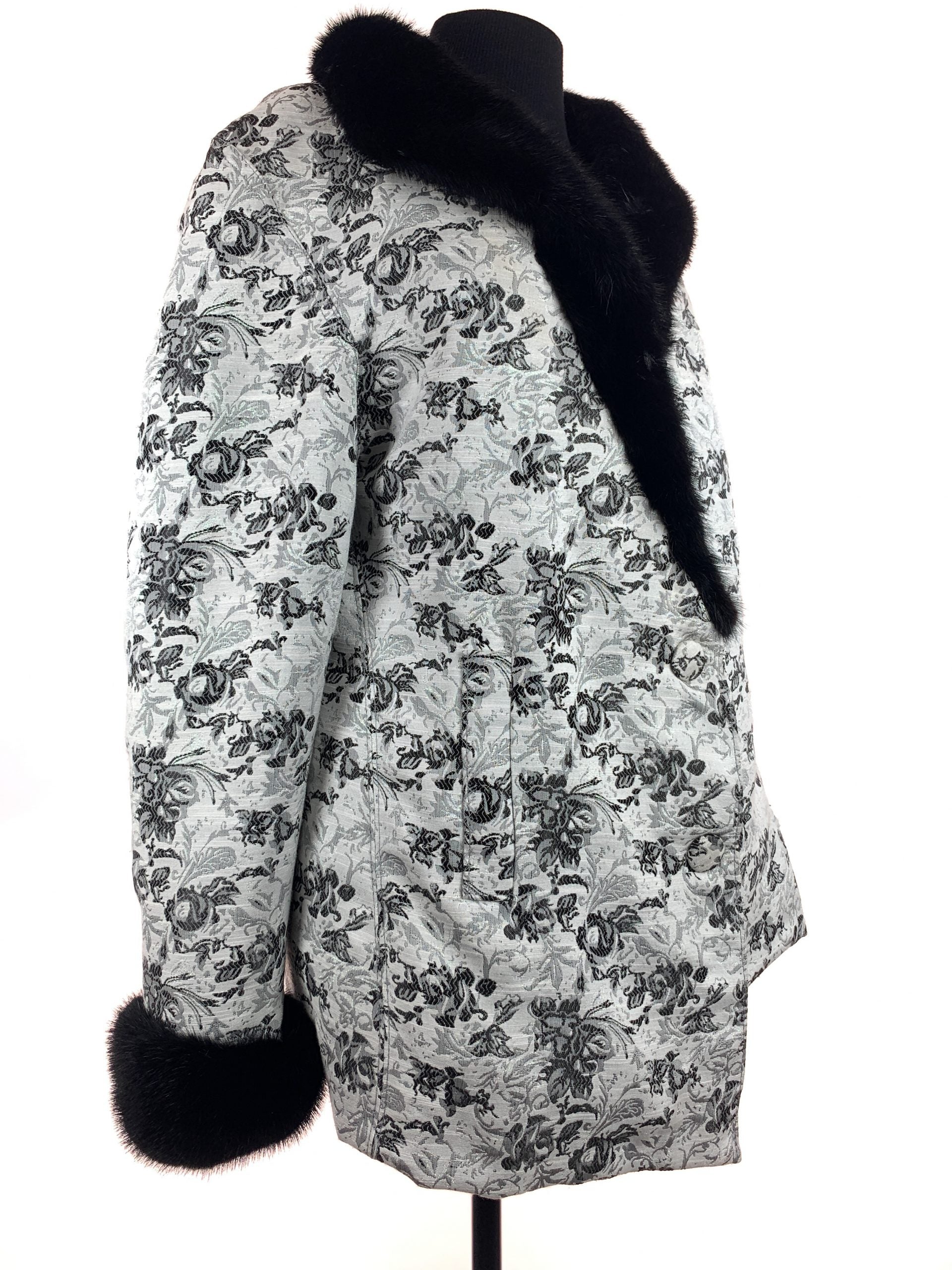 Black iris on Nordic white cloth with black mink collar and cuffs - Iris