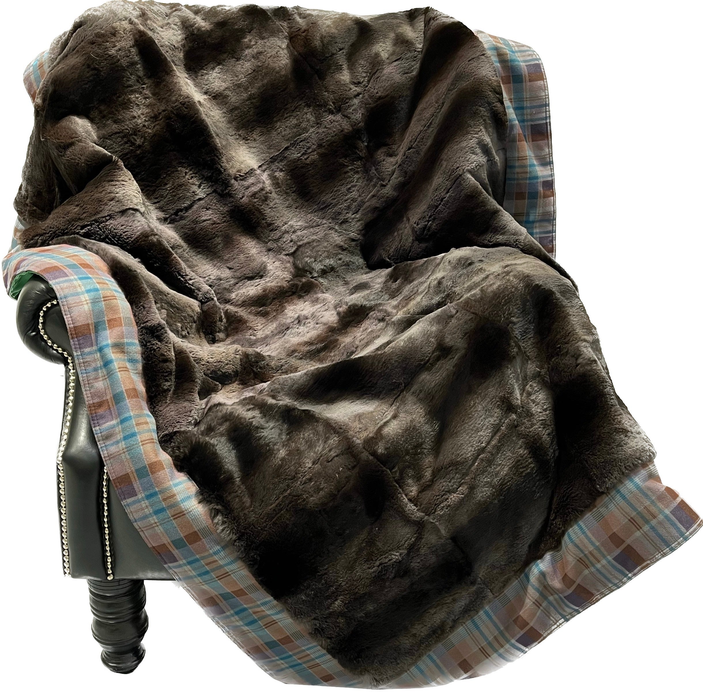 Slate brown sheared Coney throw with blue taten underlay.190x140