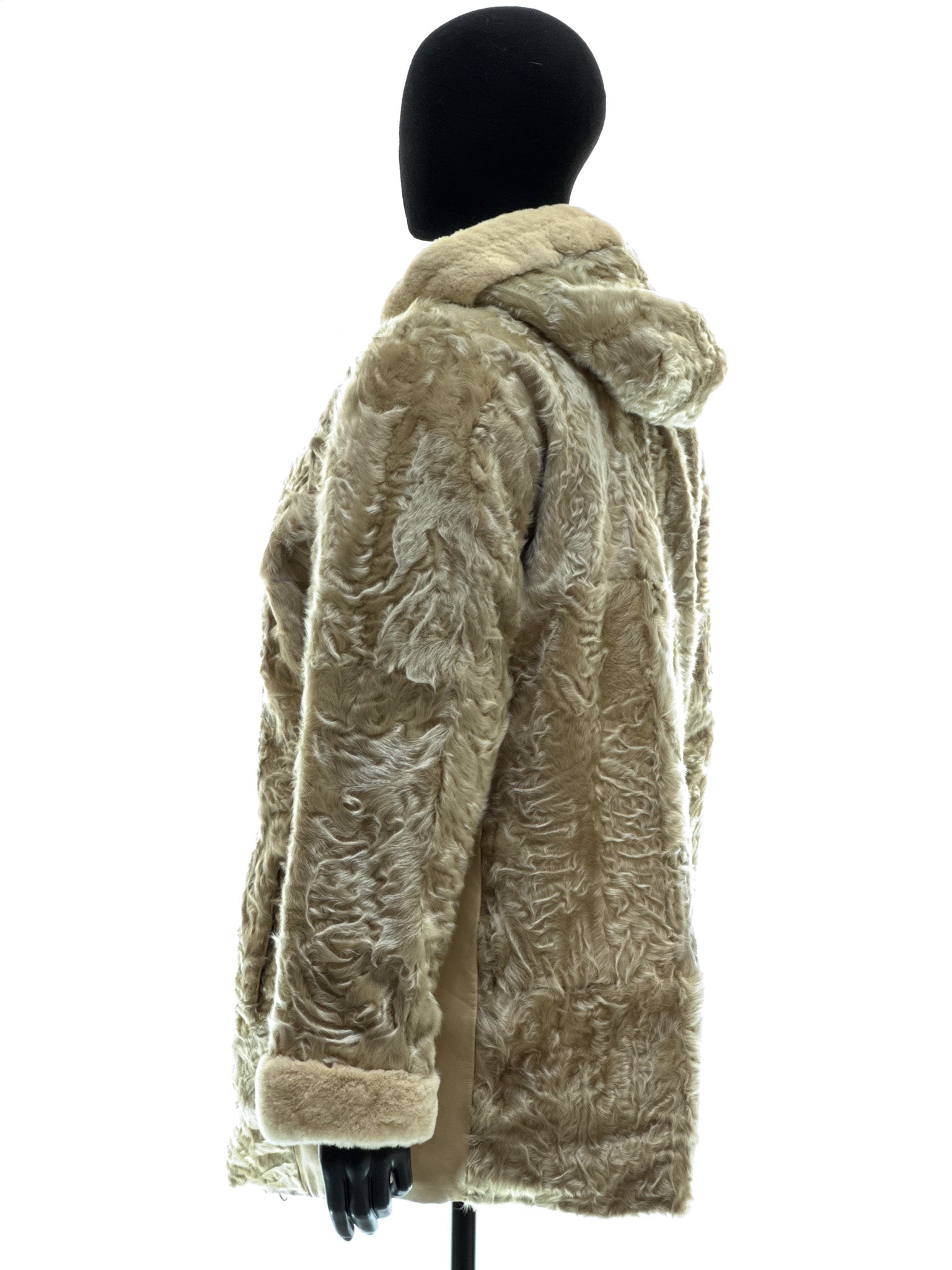 Sand-colored lamb coat with sheared mink trim, reversible design, detachable hood, and waterproof stone-colored fabric