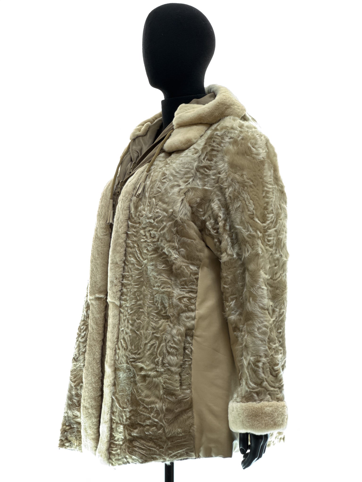 Sand-colored lamb coat with sheared mink trim, reversible design, detachable hood, and waterproof stone-colored fabric