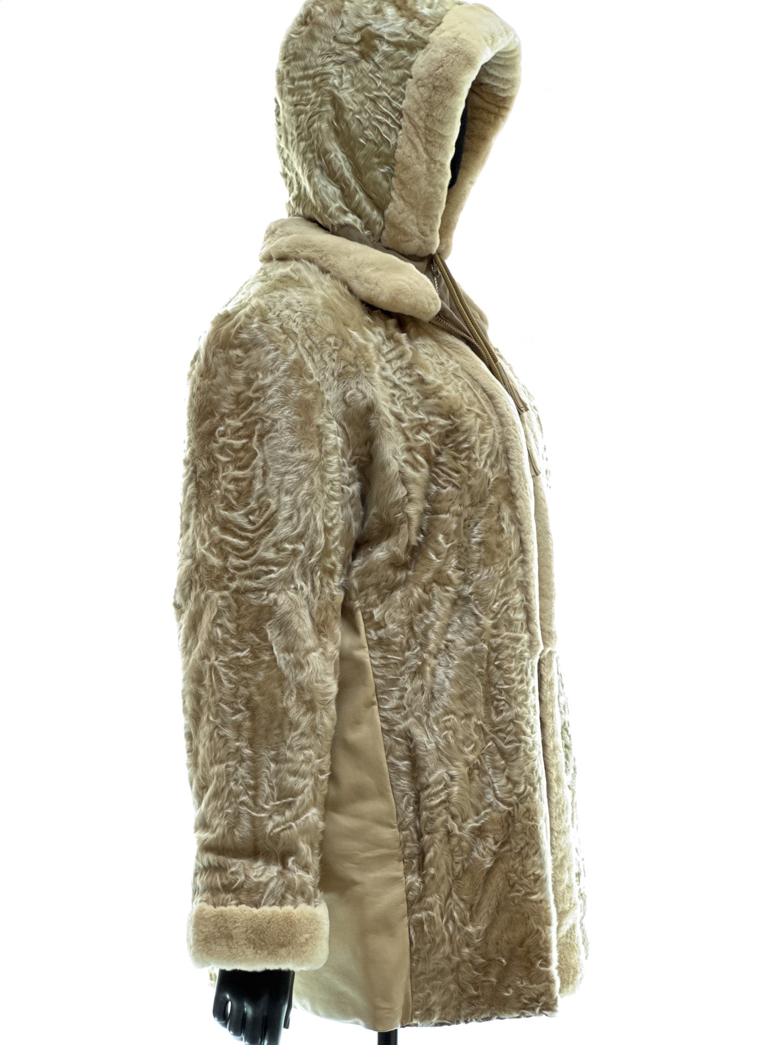 Sand-colored lamb coat with sheared mink trim, reversible design, detachable hood, and waterproof stone-colored fabric