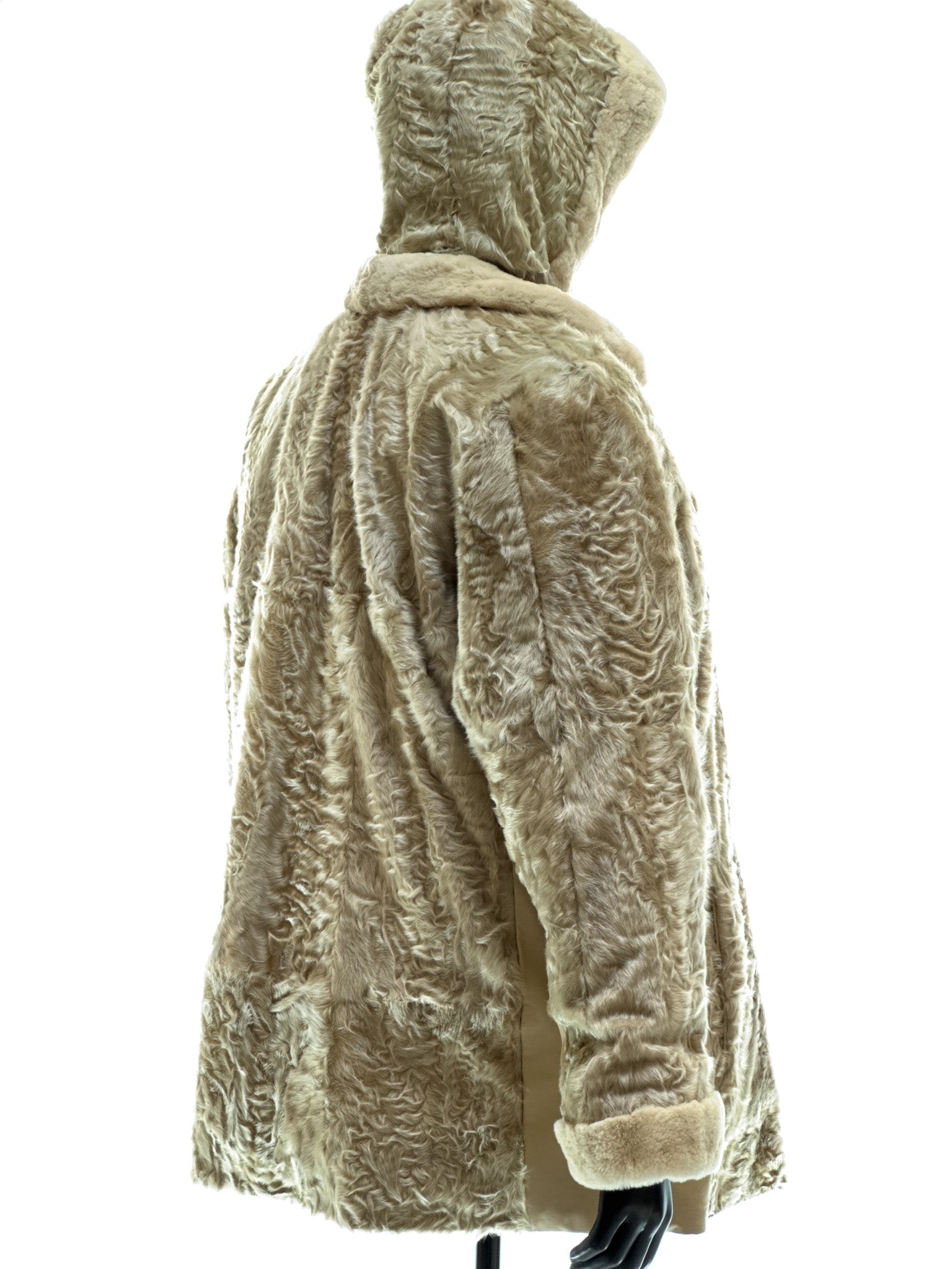 Sand-colored lamb coat with sheared mink trim, reversible design, detachable hood, and waterproof stone-colored fabric