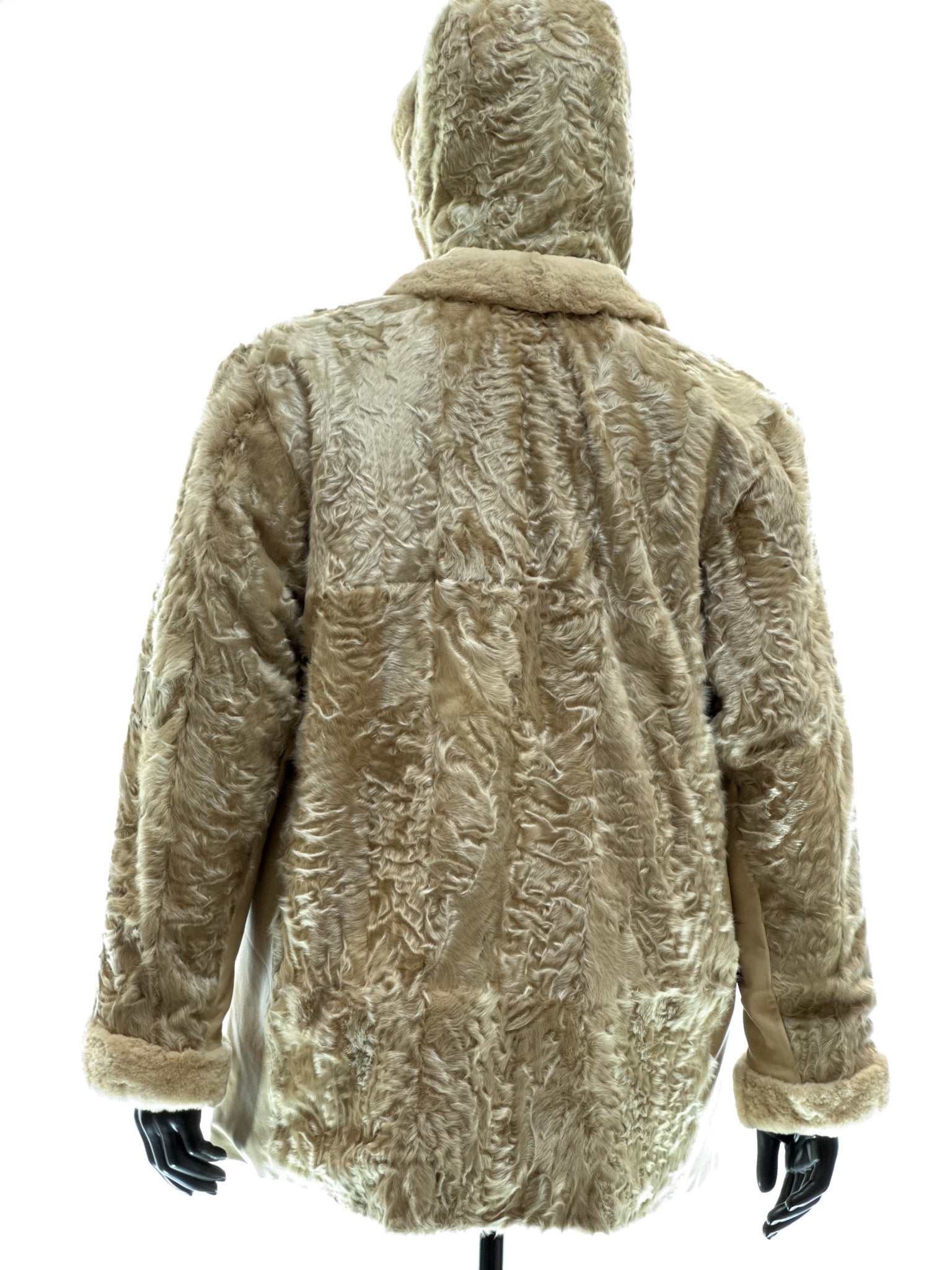 Sand-colored lamb coat with sheared mink trim, reversible design, detachable hood, and waterproof stone-colored fabric
