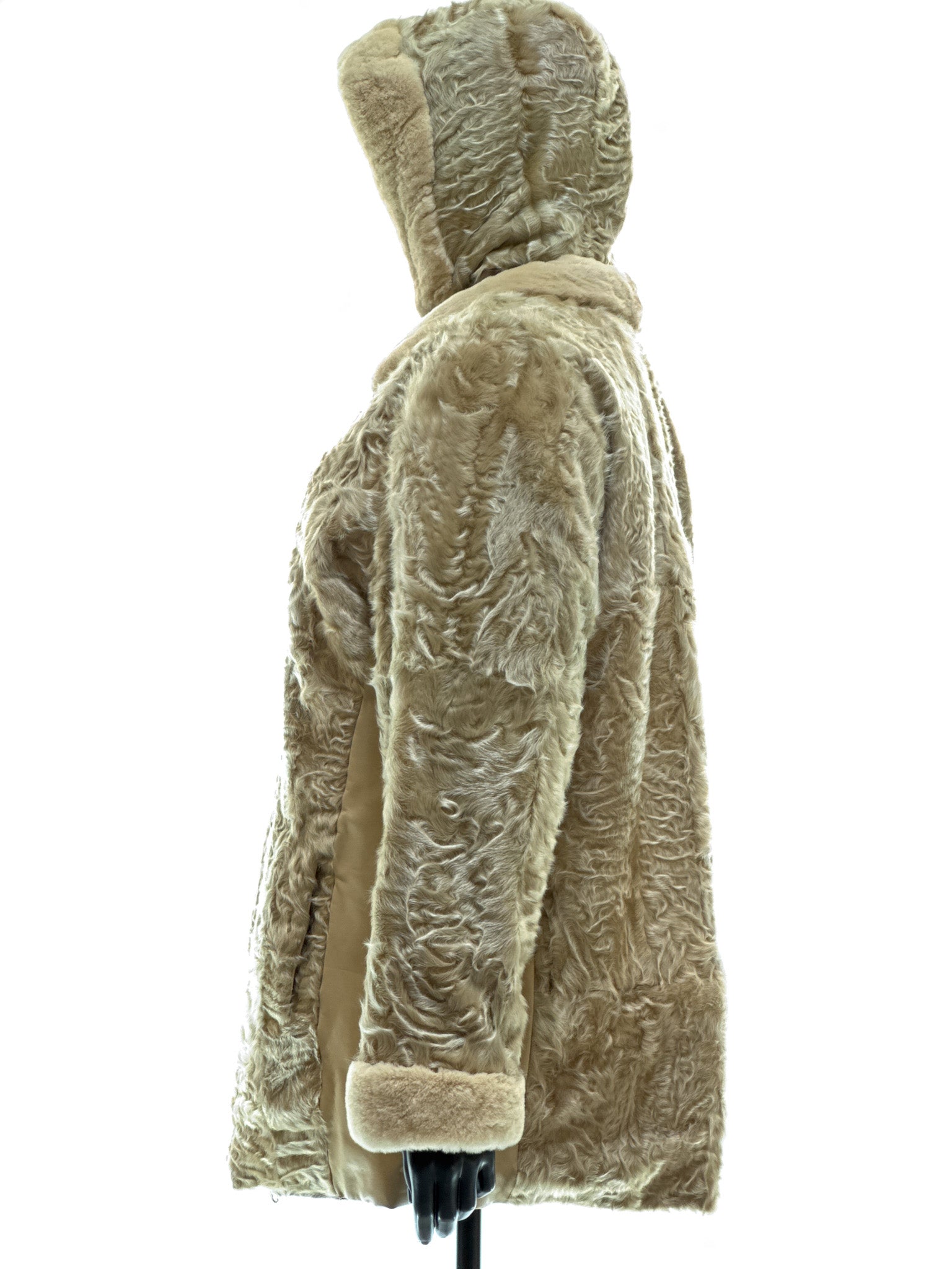 Sand-colored lamb coat with sheared mink trim, reversible design, detachable hood, and waterproof stone-colored fabric
