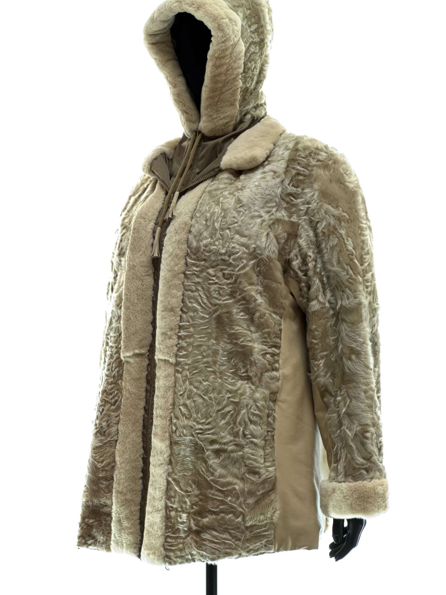 Sand-colored lamb coat with sheared mink trim, reversible design, detachable hood, and waterproof stone-colored fabric