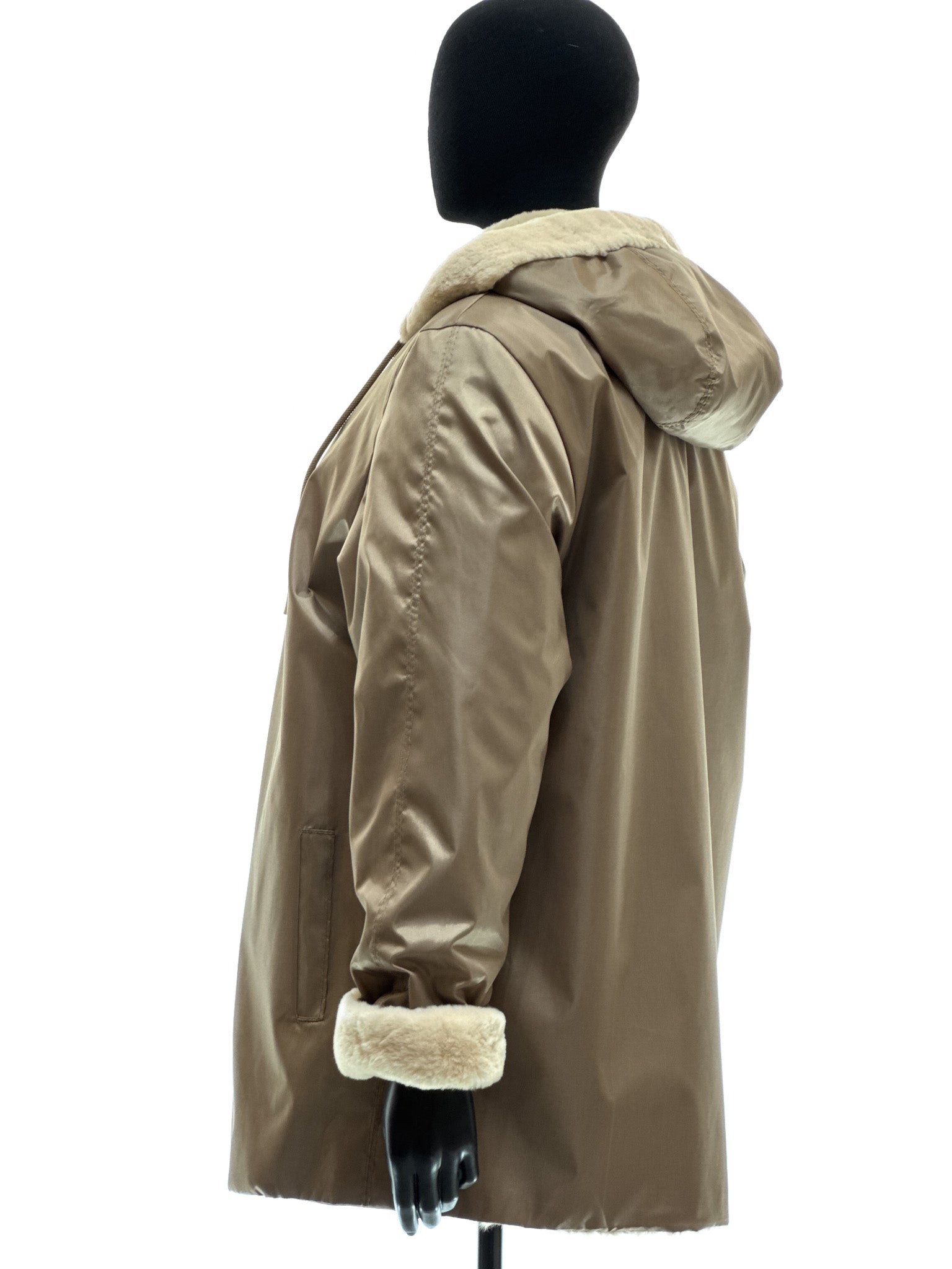 Sand-colored lamb coat with sheared mink trim, reversible design, detachable hood, and waterproof stone-colored fabric