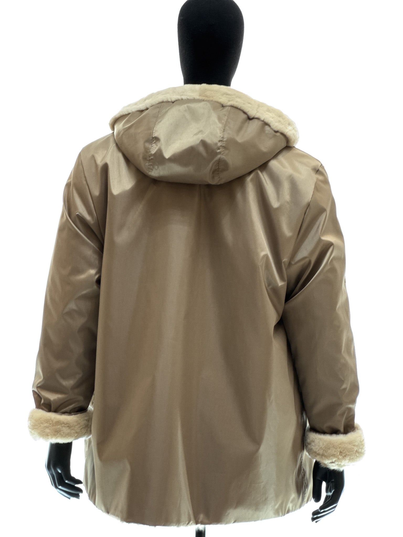 Sand-colored lamb coat with sheared mink trim, reversible design, detachable hood, and waterproof stone-colored fabric