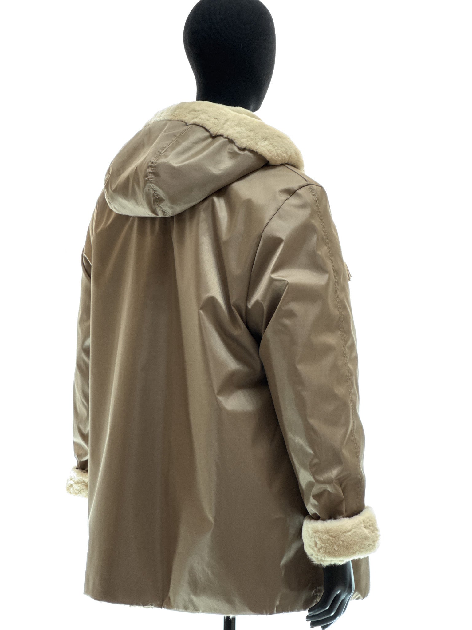 Sand-colored lamb coat with sheared mink trim, reversible design, detachable hood, and waterproof stone-colored fabric