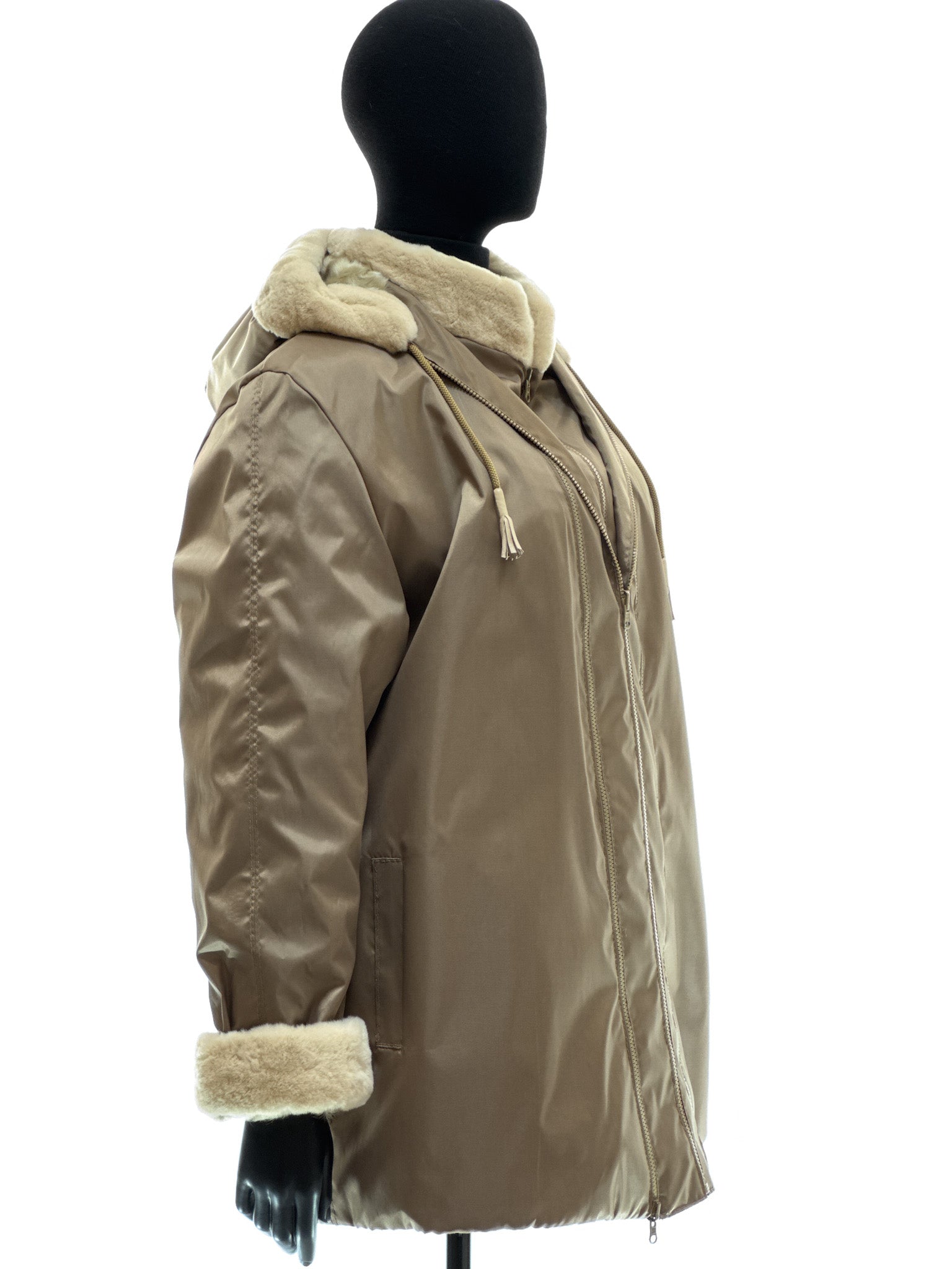 Sand-colored lamb coat with sheared mink trim, reversible design, detachable hood, and waterproof stone-colored fabric
