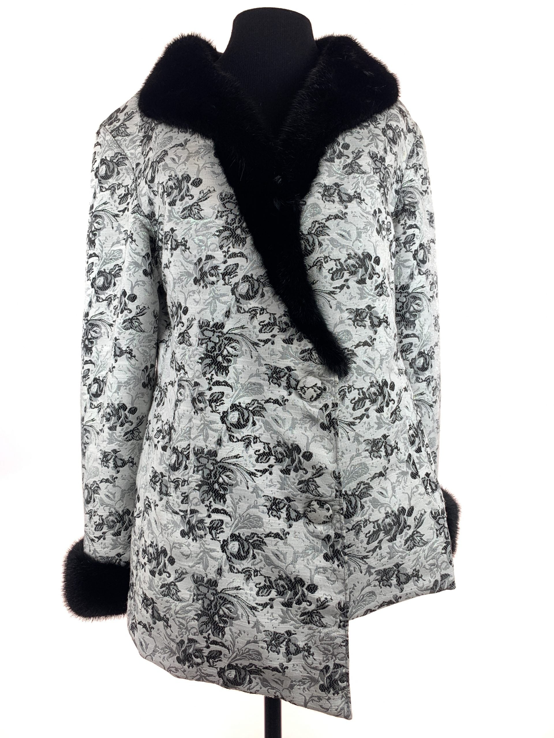 Black iris on Nordic white cloth with black mink collar and cuffs - Iris