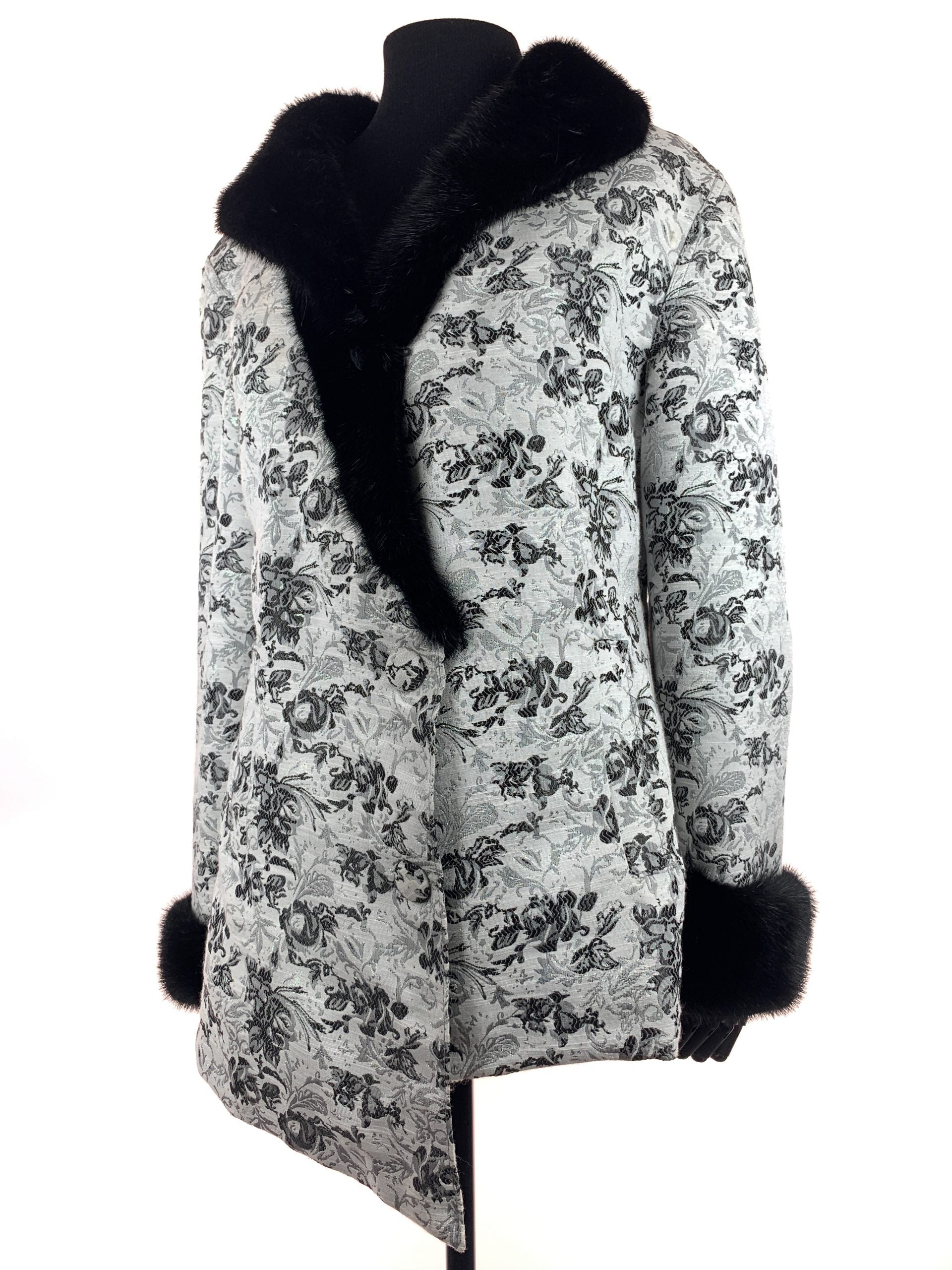 Black iris on Nordic white cloth with black mink collar and cuffs - Iris