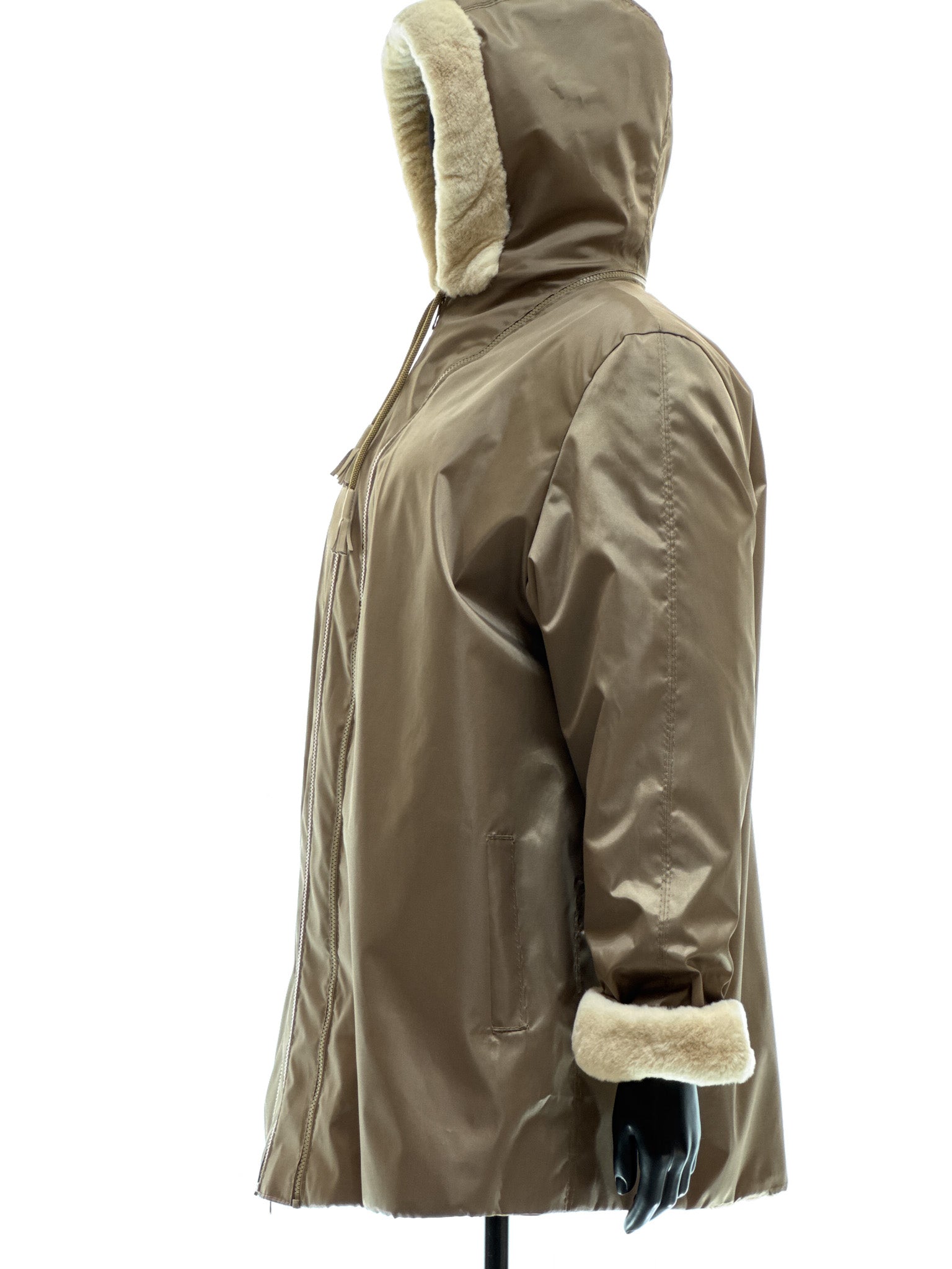 Sand-colored lamb coat with sheared mink trim, reversible design, detachable hood, and waterproof stone-colored fabric
