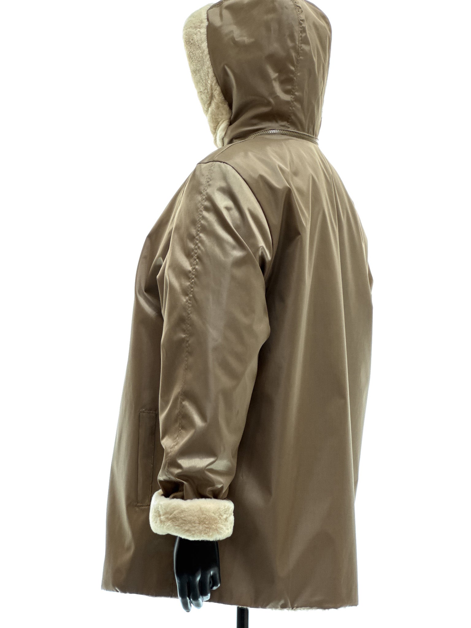 Sand-colored lamb coat with sheared mink trim, reversible design, detachable hood, and waterproof stone-colored fabric