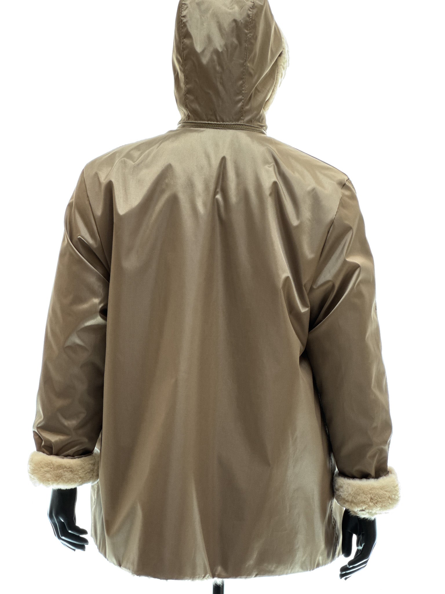 Sand-colored lamb coat with sheared mink trim, reversible design, detachable hood, and waterproof stone-colored fabric