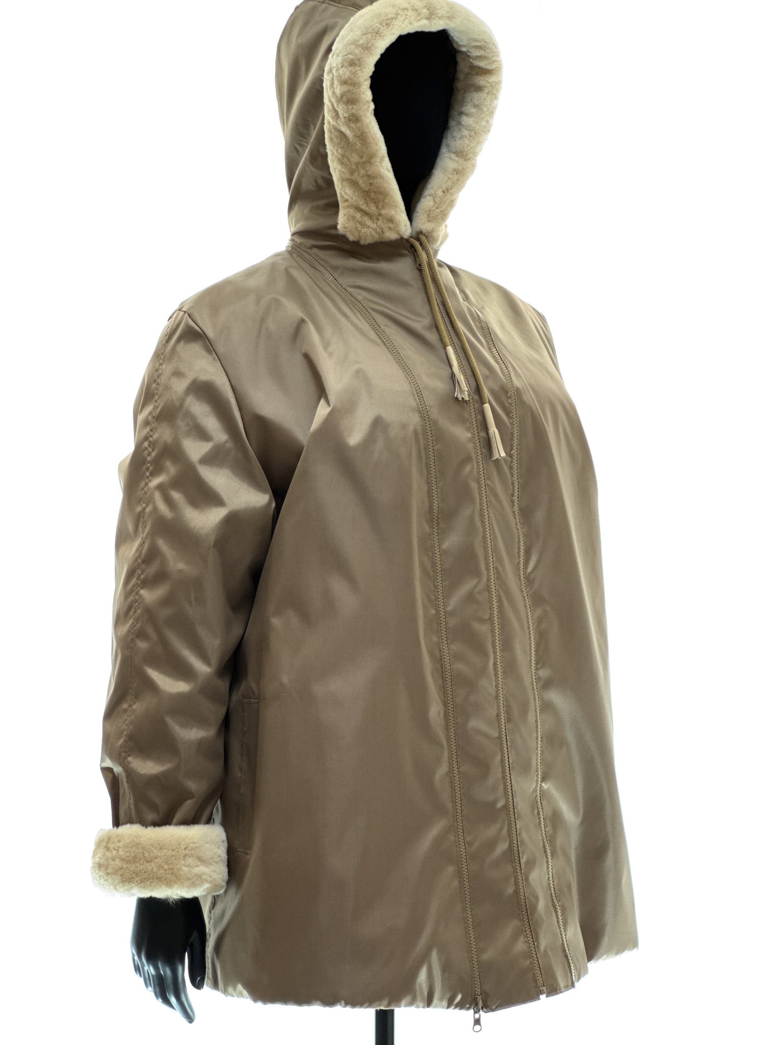 Sand-colored lamb coat with sheared mink trim, reversible design, detachable hood, and waterproof stone-colored fabric
